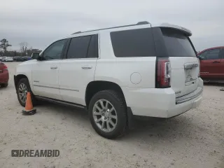 2017 GMC Yukon Denali with VIN 1GKS1CKJ5HR208979, listed as a Copart auction lot 44455835 with 99,954 mi miles and Salvage Title. Bid and sale history available at carsss.com. Image 2.