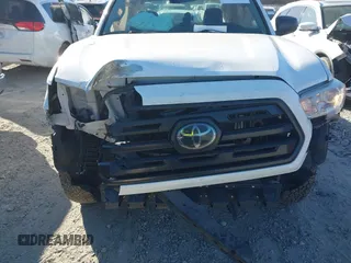2018 Toyota Tacoma SR with VIN 5TFRX5GN9JX121099, listed as a IAAI auction lot 41186232 with 127,151 mi miles and . Bid and sale history available at DreamBid. Image 6.