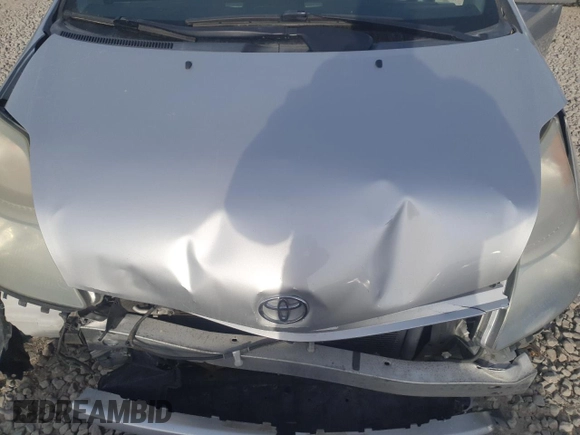 2007 Toyota Prius z VIN JTDKB20U473251436, wystawiony jako Copart lot #52282085 z przebiegiem Nie podano mil oraz Szkoda całkowita • Salvage title. Historia ofert i sprzedaży dostępna na DreamBid. Obrazek 13.