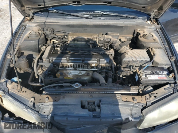 2004 Hyundai Elantra GLS z VIN KMHDN46D94U917890, wystawiony jako Copart lot #60000025 z przebiegiem 158 474 mil mil oraz Czysty tytuł • Clean title. Historia ofert i sprzedaży dostępna na DreamBid. Obrazek 11.