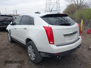 2013 Cadillac SRX Luxury Collection with VIN 3GYFNCE32DS527577, listed as a IAAI auction lot 41916467 with 137,462 mi miles and . Bid and sale history available at DreamBid. Image 3.