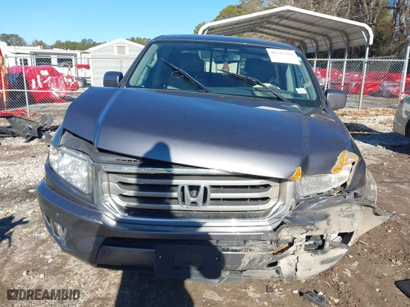 2014 Honda Ridgeline RTL with VIN 5FPYK1F52EB002984, listed as a IAAI auction lot 41347361 with 162,015 mi miles. Bid and sale history available at carsss.com. Image 12.