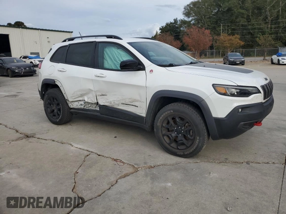 2022 Jeep Cherokee Trailhawk with VIN 1C4PJMBX4ND515208, listed as a Copart auction lot 78926024 with 94,116 mi miles and Salvage Title. Bid and sale history available at carsss.com. Image 4.