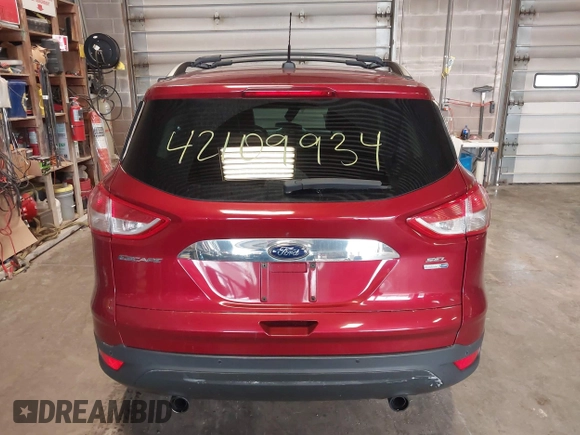 2013 Ford Escape SEL with VIN 1FMCU9HX0DUC09918, listed as a IAAI auction lot 42109934 with 135,357 mi miles and . Bid and sale history available at DreamBid. Image 16.