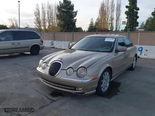 2001 Jaguar S-Type V8 with VIN SAJDA01D21GL81943, listed as a IAAI auction lot 40988369 with 104,777 mi miles. Bid and sale history available at carsss.com. Image 2.