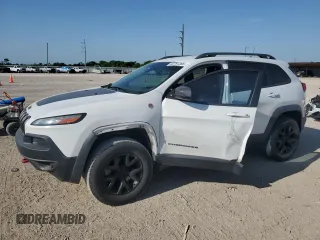 2014 Jeep Cherokee Trailhawk z VIN 1C4PJMBS8EW316946, wystawiony jako Copart lot #52791385 z przebiegiem 173 404 mil mil oraz Szkoda całkowita • Salvage title. Historia ofert i sprzedaży dostępna na DreamBid. Obrazek 1.