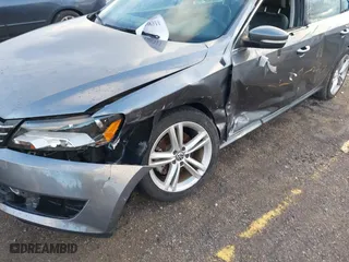 2014 Volkswagen Passat SE w/Sunroof with VIN 1VWBS7A32EC057808, listed as a IAAI auction lot 41208311 with 91,362 mi miles. Bid and sale history available at carsss.com. Image 6.
