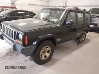 1999 Jeep Cherokee Sport z VIN 1J4FF68S4XL668081, wystawiony jako IAAI lot #42304649 z przebiegiem 194 470 mil mil oraz . Historia ofert i sprzedaży dostępna na DreamBid. Obrazek 2.