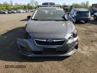 2018 Subaru Impreza z VIN 4S3GTAA65J3747060, wystawiony jako Copart lot #55040805 z przebiegiem 77 143 mil mil oraz Szkoda całkowita • Salvage title. Historia ofert i sprzedaży dostępna na DreamBid. Obrazek 5.