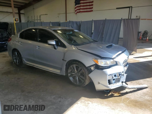 2017 Subaru WRX Premium z VIN JF1VA1E6XH9802803, wystawiony jako Copart lot #56047175 z przebiegiem 48 597 mil mil oraz Szkoda całkowita • Salvage title. Historia ofert i sprzedaży dostępna na DreamBid. Obrazek 4.