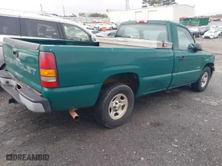 2002 Chevrolet Silverado 1500 with VIN 1GCEC14W82Z286809, listed as a IAAI auction lot 41876270 with 217,690 mi miles. Bid and sale history available at carsss.com. Image 4.