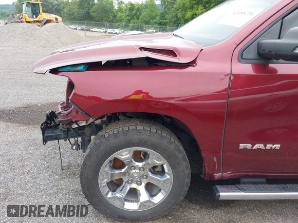 2019 Ram 1500 Big Horn z VIN 1C6SRFFT5KN570253, wystawiony jako IAAI lot #42488224 z przebiegiem 36 507 mil mil oraz . Historia ofert i sprzedaży dostępna na DreamBid. Obrazek 19.