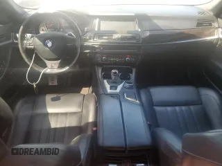 2014 BMW M5 z VIN WBSFV9C52ED593005, wystawiony jako Copart lot #49054395 z przebiegiem 71 213 mil mil oraz Szkoda całkowita • Salvage title. Historia ofert i sprzedaży dostępna na DreamBid. Obrazek 8.
