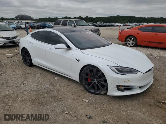 2020 Tesla Model S Long Range with VIN 5YJSA1E2XLF403088, listed as a Copart auction lot 64662604 with Not Provided miles and Salvage Title. Bid and sale history available at DreamBid. Image 4.