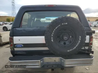 1994 Ford Bronco Custom with VIN 1FMEU15H7RLA79348, listed as a Copart auction lot 76497714 with 204,875 mi miles and Salvage Title. Bid and sale history available at DreamBid. Image 6.