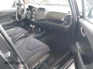 2013 Honda Fit Sport с VIN JHMGE8H59DC042068, выставлен на аукционе IAAI как лот 41803884 с пробегом 128 223 миль миль и . История ставок и продаж доступна на DreamBid. Изображение 5.