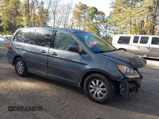 2010 Honda Odyssey EX z VIN 5FNRL3H48AB052406, wystawiony jako IAAI lot #40734161 z przebiegiem 133 499 mil mil oraz . Historia ofert i sprzedaży dostępna na DreamBid. Obrazek 1.