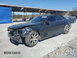2012 Chrysler 300 SRT8 with VIN 2C3CCAFJ0CH801896, listed as a Copart auction lot 46991275 with 117,467 mi miles and Salvage Title. Bid and sale history available at carsss.com. Image 1.