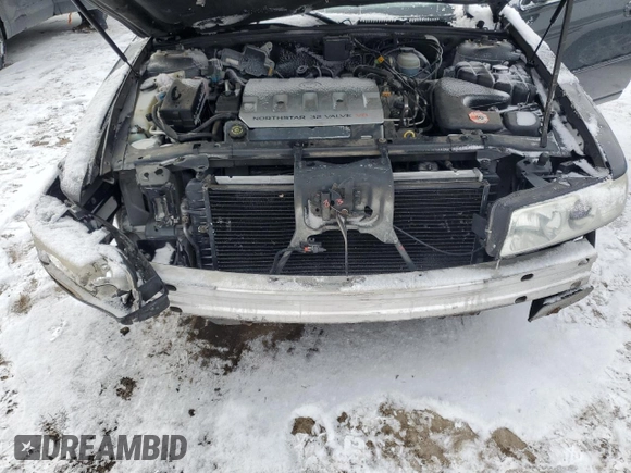 2002 Cadillac Seville Touring STS z VIN 1G6KY549X2U177791, wystawiony jako Copart lot #89313345 z przebiegiem 171 707 mil mil oraz Szkoda całkowita • Salvage title. Historia ofert i sprzedaży dostępna na DreamBid. Obrazek 12.
