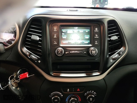 2015 Jeep Cherokee Sport with VIN 1C4PJMAB8FW685146, listed as a IAAI auction lot 42842417 with 130,325 mi miles and . Bid and sale history available at DreamBid. Image 26.