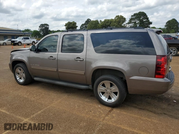 2013 Chevrolet Suburban LS z VIN 1GNSCHE00DR221307, wystawiony jako Copart lot #54684925 z przebiegiem 203 169 mil mil oraz Szkoda całkowita • Salvage title. Historia ofert i sprzedaży dostępna na DreamBid. Obrazek 2.