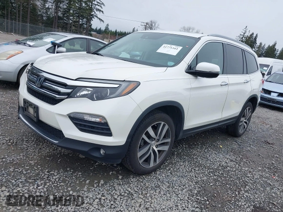 2017 Honda Pilot Elite with VIN 5FNYF6H06HB096156, listed as a IAAI auction lot 41771161 with 73,889 mi miles and . Bid and sale history available at DreamBid. Image 17.