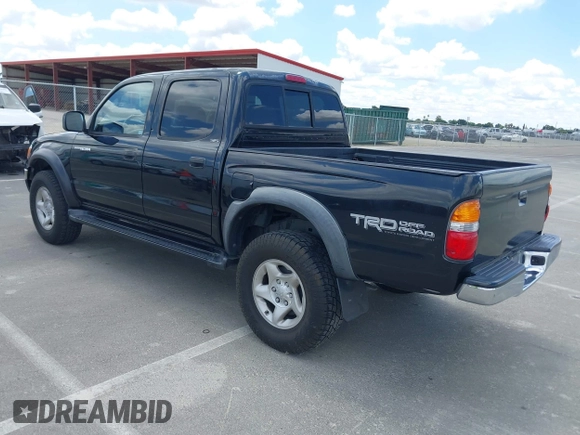 2003 Toyota Tacoma PreRunner z VIN 5TEGN92N03Z210194, wystawiony jako IAAI lot #42243037 z przebiegiem 241 047 mil mil oraz . Historia ofert i sprzedaży dostępna na DreamBid. Obrazek 3.