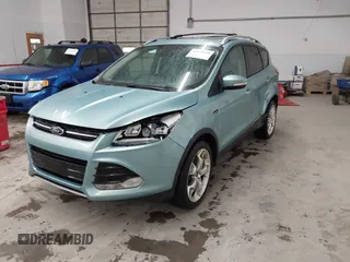 2013 Ford Escape Titanium with VIN 1FMCU9J9XDUC60029, listed as a IAAI auction lot 41936948 with 184,012 mi miles and . Bid and sale history available at DreamBid. Image 17.
