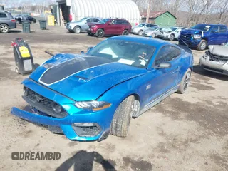 2021 Ford Mustang Mach 1 with VIN 1FA6P8R05M5554964, listed as a IAAI auction lot 41694871 with 38,788 mi miles. Bid and sale history available at carsss.com. Image 17.