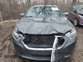 2015 Ford Taurus Limited with VIN 1FAHP2J88FG153326, listed as a IAAI auction lot 41465344 with 98,727 mi miles. Bid and sale history available at carsss.com. Image 12.