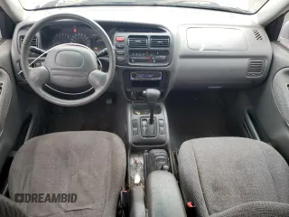 1999 Suzuki Grand Vitara JLX z VIN JS3TD62V9X4123460, wystawiony jako Copart lot #58574925 z przebiegiem 260 368 mil mil oraz Szkoda całkowita • Salvage title. Historia ofert i sprzedaży dostępna na DreamBid. Obrazek 8.