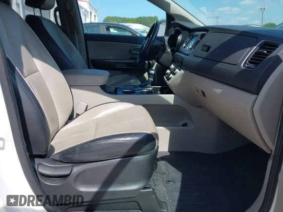 2021 Kia Sedona LX with VIN KNDMB5C12M6661917, listed as a IAAI auction lot 42129682 with 80,321 mi miles and . Bid and sale history available at carsss.com. Image 5.