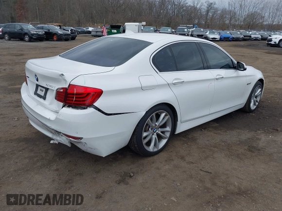 2014 BMW 5 Series 535i xDrive with VIN WBA5B3C57ED537549, listed as a IAAI auction lot 41047583 with 69,005 mi miles and . Bid and sale history available at carsss.com. Image 4.