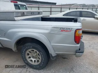 2003 Mazda B-Series 2WD Truck DS with VIN 4F4YR16V93TM16379, listed as a IAAI auction lot 41586832 with 147,300 mi miles. Bid and sale history available at carsss.com. Image 6.