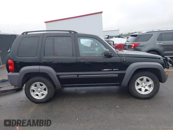 2003 Jeep Liberty Sport with VIN 1J4GK48KX3W656837, listed as a IAAI auction lot 40785615 with 164,450 mi miles and . Bid and sale history available at DreamBid. Image 13.