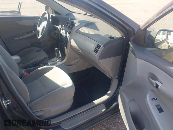 2010 Toyota Corolla with VIN 2T1BU4EE2AC437739, listed as a IAAI auction lot 42101264 with 162,051 mi miles. Bid and sale history available at carsss.com. Image 5.