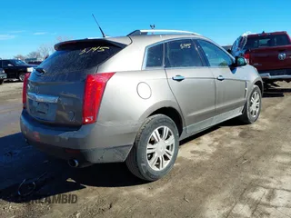2012 Cadillac SRX Luxury Collection with VIN 3GYFNAE35CS549902, listed as a IAAI auction lot 41575145 with 201,054 mi miles and . Bid and sale history available at carsss.com. Image 4.