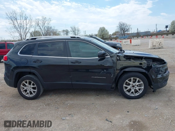 2014 Jeep Cherokee Latitude with VIN 1C4PJLCB6EW186576, listed as a IAAI auction lot 42099422 with 117,681 mi miles and . Bid and sale history available at DreamBid. Image 14.