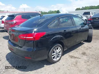 2016 Ford Focus SE with VIN 1FADP3F29GL256160, listed as a IAAI auction lot 42188124 with 72,868 mi miles and . Bid and sale history available at DreamBid. Image 4.