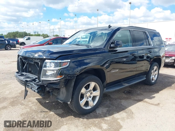 2015 Chevrolet Tahoe LT with VIN 1GNSCBKCXFR214072, listed as a IAAI auction lot 40512435 with 98,955 mi miles and . Bid and sale history available at DreamBid. Image 19.