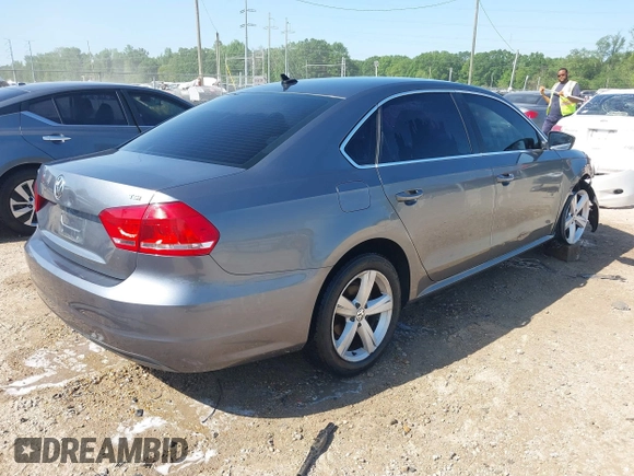 2015 Volkswagen Passat 1.8T Wolfsburg Ed with VIN 1VWAT7A3XFC115934, listed as a IAAI auction lot 41948035 with 243,143 mi miles. Bid and sale history available at carsss.com. Image 4.