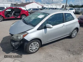 2015 Toyota Yaris L with VIN VNKJTUD34FA026280, listed as a IAAI auction lot 41691078 with 81,030 mi miles and . Bid and sale history available at carsss.com. Image 2.
