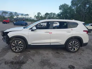 2019 Hyundai Santa Fe SEL with VIN 5NMS33AD0KH006550, listed as a IAAI auction lot 41894306 with 80,920 mi miles and . Bid and sale history available at DreamBid. Image 15.