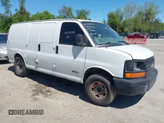 2004 Chevrolet Express Cargo Van with VIN 1GCGG25V441118708, listed as a IAAI auction lot 42144915 with 327,928 mi miles. Bid and sale history available at carsss.com. Image 1.