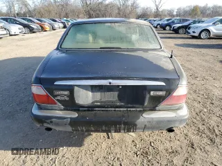 1998 Jaguar XJ with VIN SAJHX1245WC819762, listed as a Copart auction lot 81480174 with 132,491 mi miles and Salvage title. Bid and sale history available at DreamBid. Image 6.