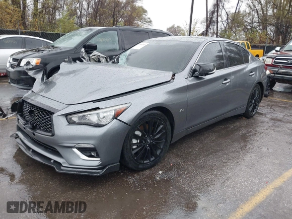 2018 Infiniti Q50 Luxe z VIN JN1EV7AP5JM350376, wystawiony jako IAAI lot #40881855 z przebiegiem 84 501 mil mil oraz . Historia ofert i sprzedaży dostępna na DreamBid. Obrazek 2.
