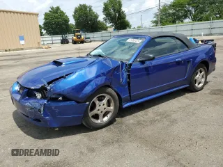 2004 Ford Mustang Deluxe with VIN 1FAFP44654F208654, listed as a Copart auction lot 61385425 with 108,916 mi miles and Salvage title. Bid and sale history available at DreamBid. Image 1.