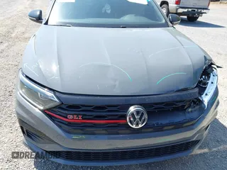 2021 Volkswagen Jetta GLI S z VIN 3VW6T7BU9MM052902, wystawiony jako IAAI lot #42286711 z przebiegiem 91 519 mil mil oraz . Historia ofert i sprzedaży dostępna na DreamBid. Obrazek 22.
