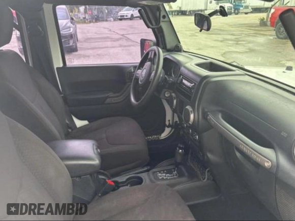 2013 Jeep Wrangler Unlimited Sport with VIN 1C4BJWDG6DL582321, listed as a Copart auction lot 61109125 with 182,953 mi miles and Clean title. Bid and sale history available at DreamBid. Image 5.