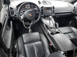 2014 Porsche Cayenne S with VIN WP1AB2A25ELA57213, listed as a Copart auction lot 57843255 with 165,501 mi miles and Salvage title. Bid and sale history available at DreamBid. Image 8.